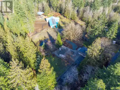 Welcome to your dream equestrian property nestled on 4.75 gently rolling, fenced acres in desirable...