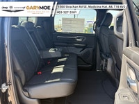 The 2026 Ram 1500 Sport is a striking truck in a bold black finish with a powerful 4x4 drivetrain, p... (image 7)