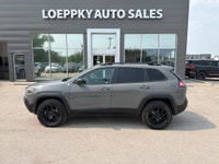 2022 Jeep Cherokee Trailhawk Elite Available Now at Loeppky Auto Sales Take on every adventure in co... (image 1)