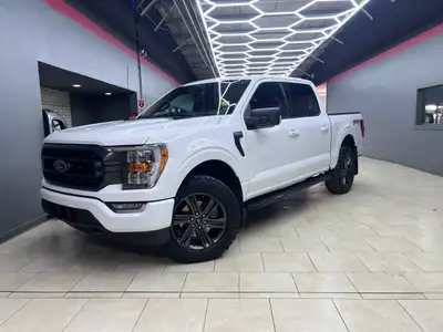 Experience the perfect blend of power and sophistication with the 2022 Ford F-150 XLT, presented in...