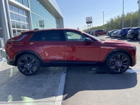 The 2026 Cadillac LYRIQ Signature Sport, finished in Radiant Red Tintcoat with a refined Oxford Ston... (image 9)