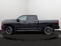 This Ram 2500 delivers a ESL 6.4L V8 HEMI(R) HD engine engine powering this Automatic transmission.... (image 1)