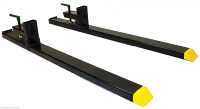 NEW HEAVY DUTY CLAMP ON BUCKET FORKS HLA25 Clamp on pallet forks slide over the cutting edge of the...