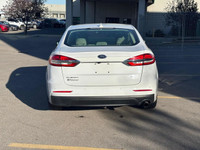 This 2020 Ford Fusion offers a perfect balance of style, comfort, and efficiency, making it an ideal... (image 3)