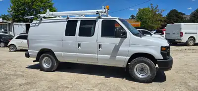Call 416-648-0721 - ONE OWNER - Runs great -ONLY 118000km's! 2009 Ford E-350 Cargo van with Roof Rac...