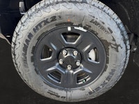 This 2025 JEEP WRANGLER 4-DOOR SPORT has the following options Cloth Low-Back Bucket Seats, Uconnect... (image 9)