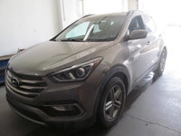 Finished in Silver with a Grey interior, this 2017 Hyundai Santa Fe Sport Base is a practical used S... (image 1)