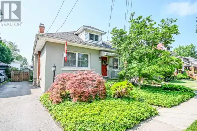 An enchanted garden awaits you at this adorable 1920's home. On the outside looking in, it is a quai...