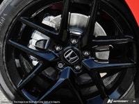 The 2026 Honda Civic Sedan Hybrid in Sporty Red brings sophistication and efficiency with its front-... (image 7)