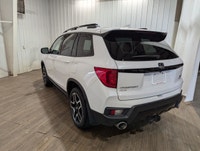 Experience the perfect blend of elegance and performance with the 2023 Honda Passport Touring AWD, d... (image 4)