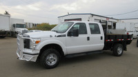 2014 Ford F-350 Flatbed Truck 4X4 Low Km's AMVIC LICENSED..... Ask for Special Financing & Leasing d... (image 1)