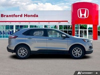 Command the road and embrace adventure in this sophisticated 2023 Ford Edge SEL, striking in Silver.... (image 6)