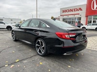 Sporting the performance-oriented 2021 Honda Accord Sedan Sport 2.0 in captivating Crystal Black Pea... (image 6)