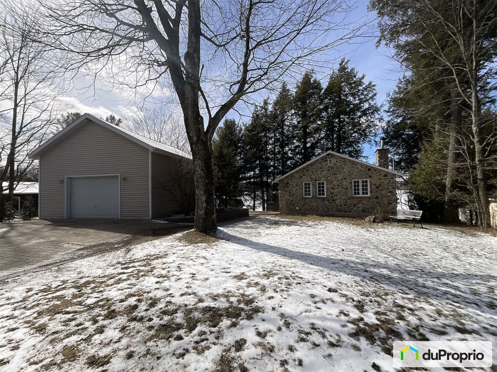 $975,000 - Cottage for sale in Dunham — photo 1