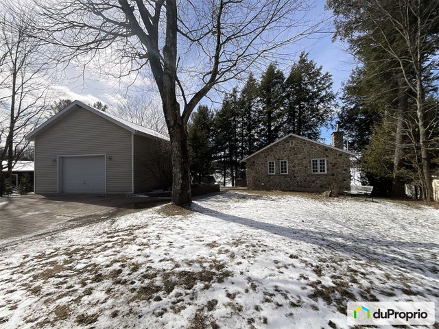 $975,000 - Cottage for sale in Dunham — photo 1