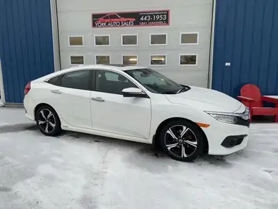 Touring model fully appointed with leather 1.5 Litre Turbo Civic in great condition, ready to enjoy....