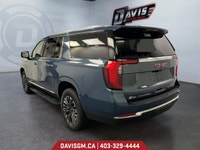 The 2025 GMC Yukon XL Elevation 4WD commands attention with bold styling, extended cargo versatility... (image 2)