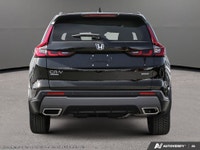 The 2025 Black Honda CR-V Hybrid Touring AWD is your gateway to balanced power and superior handling... (image 4)