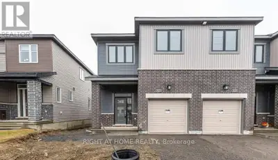 Don't miss this fantastic opportunity to live in a modern, spacious end-unit townhouse in immaculate...