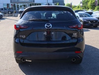 2025 MAZDA CX-5: A Fusion of Style and PerformanceIntroducing the 2025 MAZDA CX-5 in the sleek GX tr... (image 2)