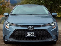 The 2020 Toyota Corolla LE, with its stunning blue exterior and efficient front-wheel drive, offers... (image 2)