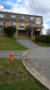 This attractive building is located on a cul-de-sac at the top of Main Avenue in Fairview. Most unit... (image 6)