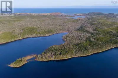 This stunning parcel encompasses over 13 acres of land and offers a rare opportunity to own over 2,9...