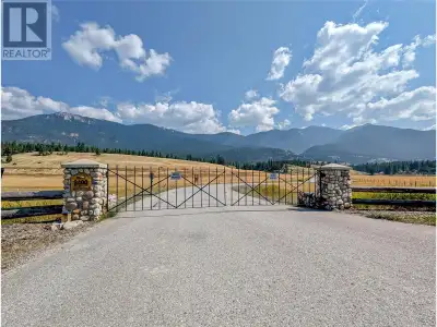 PRIVATE ESTATE ACREAGE! Welcome to Elkhorn Estates, a gated community in Windermere, BC, where tranq...