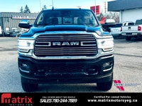 The 2022 Ram 2500 Laramie 4x4 Crew Cab with a 6'4in. box is a heavy-duty truck featuring a 6.4L V8 e... (image 3)