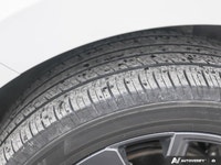 * All-Wheel Drive (AWD) * 19-inch aluminum wheels with a dark finish * RS-specific black grille, bla... (image 9)