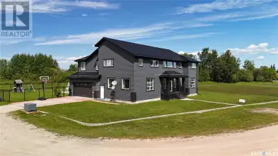 Welcome to 701 Bay St., a home with six bedrooms and four bathrooms. Large banks of windows fill the...