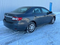 2013 Toyota Corolla CE Sedan 1.8L FWD Livraison partout au Québec possible ** Tous les échanges sont... (image 6)
