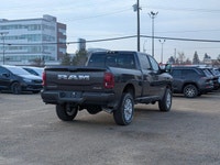 The 2026 Ram 3500 Laramie Crew Cab in Granite Crystal Metallic combines heavy-duty capability with p... (image 6)