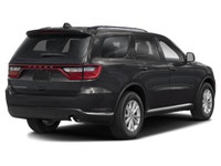 The 2025 Dodge Durango GT Plus AWD is a striking presence with its bold black exterior and robust al... (image 1)