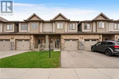 A Must See! Welcome to 1426 Caen Avenue, Woodstock — a beautifully maintained freehold townhome buil...