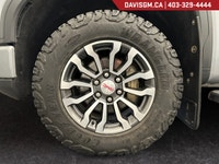The 2023 GMC Sierra 1500 AT4 Crew Cab Standard Box 4WD combines premium off-road capability, advance... (image 8)