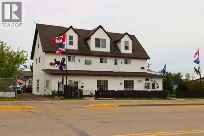 A grand income property with unlimited potential and pure Olde Country charm! Discover a rare, multi...