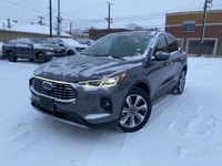 **WE WILL BEAT ANY DEALER IN THE CITY** Carbonized Gray Metallic 2024 Ford Escape Platinum AWD 8-Spe... (image 1)