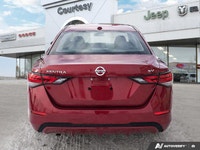 Recognized as an IIHS Top Safety Pick, this stunning red 2021 Nissan Sentra SV delivers safety and s... (image 4)