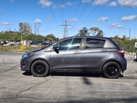 Come see this certified 2019 Toyota Yaris Hatchback LE | 5-Speed Manual | A/C | Heated Seats | Rear... (image 1)