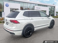 This Volkswagen Tiguan delivers a Intercooled Turbo Regular Unleaded I-4 2.0 L/121 engine powering t... (image 4)