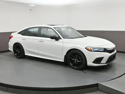 The 2024 Honda Civic Sport is equipped with a 2.0L 4-cylinder engine paired with a smooth front-whee...