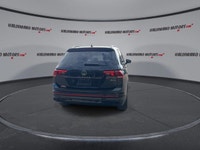This Volkswagen Tiguan has a strong Turbo Gas 4cyl 2.0 L engine powering this Automatic transmission... (image 6)