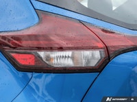 Command attention in this former daily rental vibrant Electric Blue Metallic 2024 Nissan Kicks SV, e... (image 7)