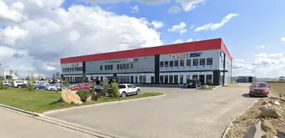FOR LEASE This 5,000 SF Industrial shop, located in Queens Business Park, is available for lease. Th...