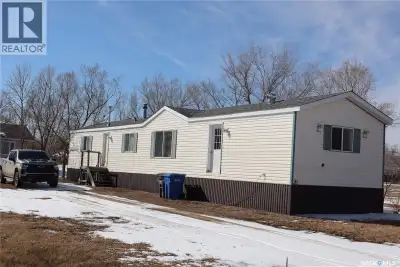 Located in the historic Town of Willow Bunch you will find this Mobile home on an owned lot. The 121...