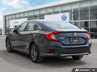 * 8-way power-adjustable driver's seat. * Heated front seats. * Dual-zone automatic climate control... (image 2)