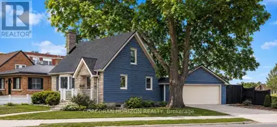 The updated kitchen is bright and welcoming, with stainless steel appliances, a counter and seating...