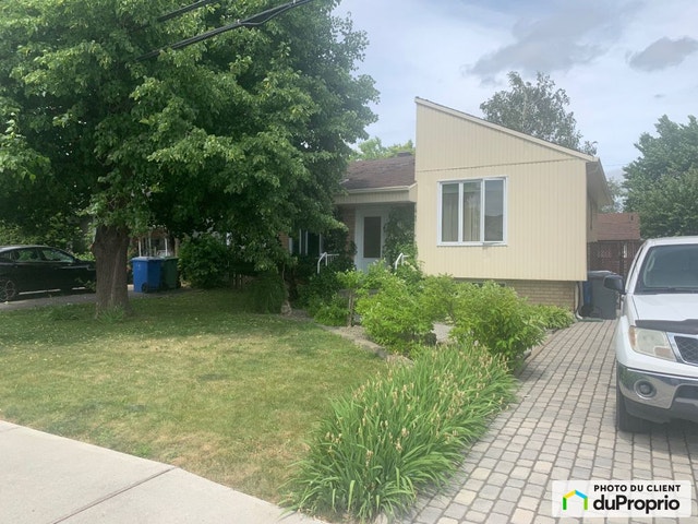 $599,000 - Bi-Level for sale in St-Basile-Le-Grand — photo 1