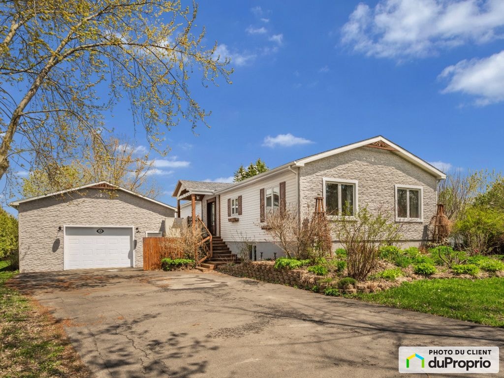 $612,000 - Bungalow for sale — photo 1